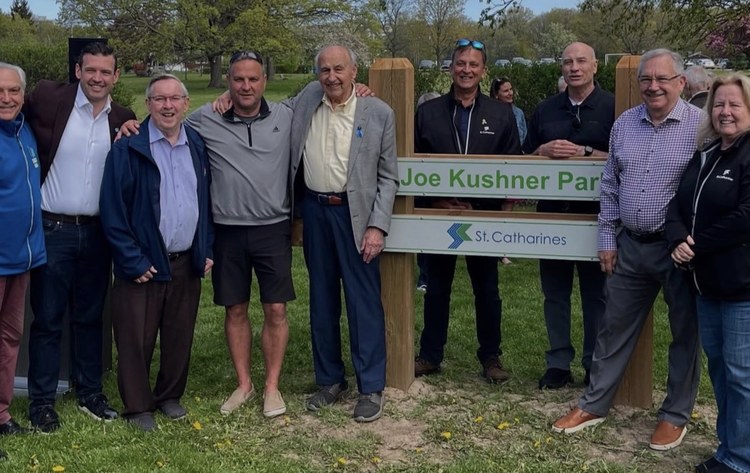 Councillors, staff and family at the unveiling of the Joe Kushner Park sign in St. Catharines