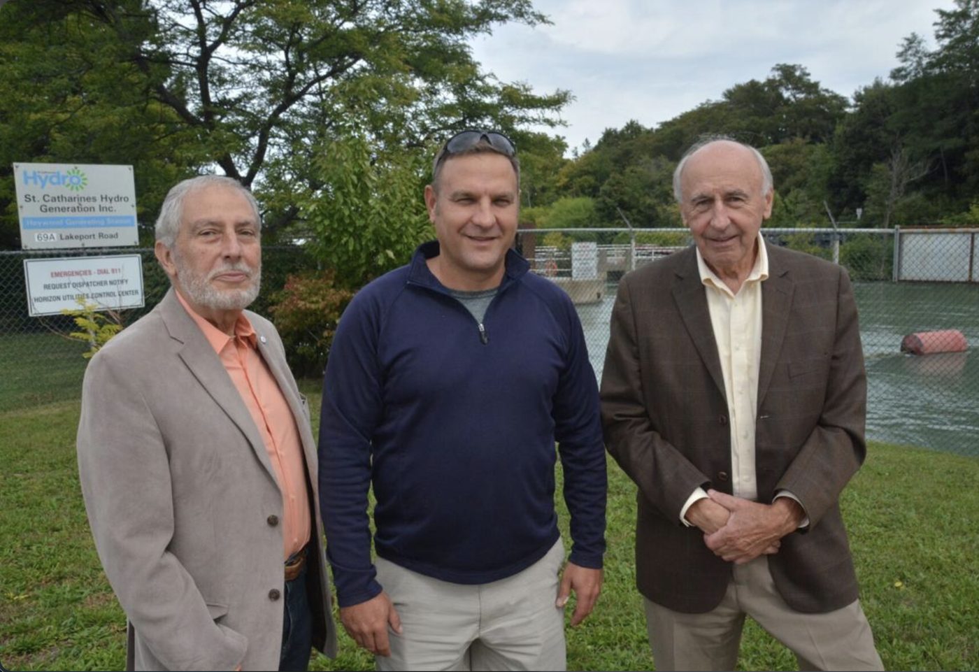 Matt Harris with two colleagues outside the Heywood Generating Station, St. Catharines Hydro Generation Inc., on Lakeport Road